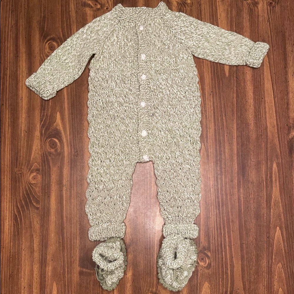 Knitted one piece baby outfit and footwear